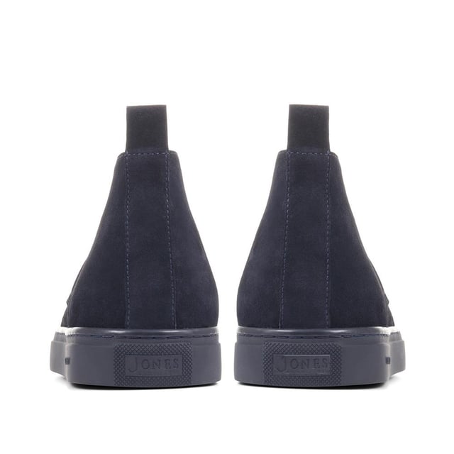 Chukka boots started out as a practical option for soldiers in the desert, these days the chukka fulfils the demands of every off-duty pursuit. Lightweight and equipped with a hardy Italian rubber sole, Sullivan features a high-cut profile crafted with supple suede, showcasing a traditional three eye-let lace-up and full leather linings, comfortable and versatile enough to serve you from work to weekend.

We recommend if you are between sizes to select the smaller than your usual.