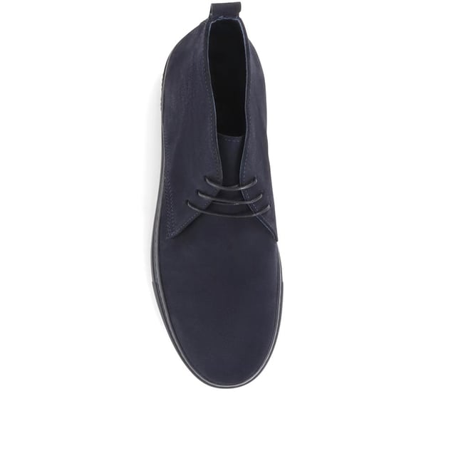 Chukka boots started out as a practical option for soldiers in the desert, these days the chukka fulfils the demands of every off-duty pursuit. Lightweight and equipped with a hardy Italian rubber sole, Sullivan features a high-cut profile crafted with supple suede, showcasing a traditional three eye-let lace-up and full leather linings, comfortable and versatile enough to serve you from work to weekend.

We recommend if you are between sizes to select the smaller than your usual.