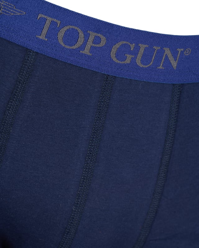 Die Boxershorts sind eng anliegend und besitzen an der Hüfte einen Gummizug mit Top Gun Logo. Hierbei handelt es sich um einen Doppelpack der in verschiedenen Farbkominationen erhältlich ist.