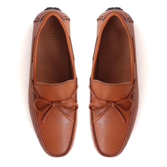 Discover the epitome of luxury with our exquisite leather moccasins, meticulously crafted from premium leather to provide unparalleled comfort and sophistication. These timeless slip-on shoes boast a streamlined silhouette and supple leather lining, making them the ideal choice for those seeking both style and refinement.