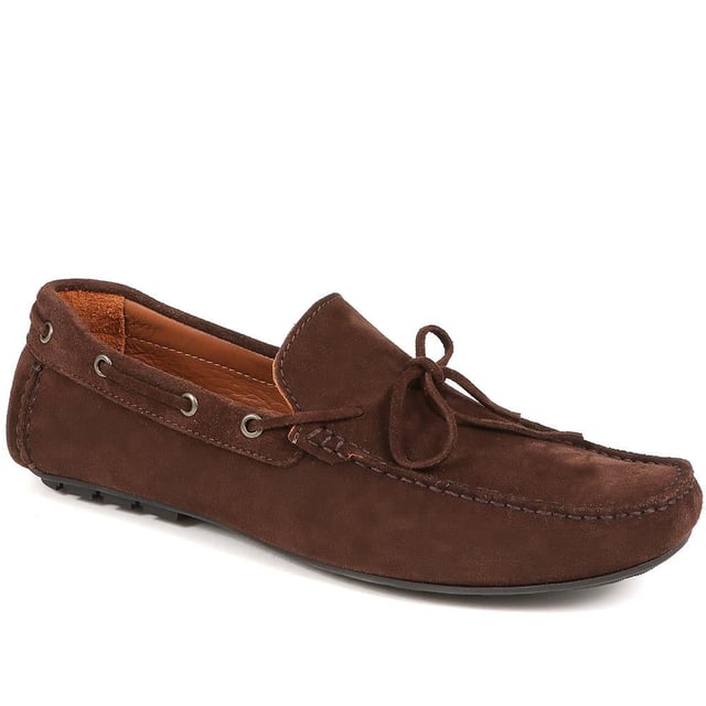 Discover the epitome of luxury with our exquisite leather moccasins, meticulously crafted from premium leather to provide unparalleled comfort and sophistication. These timeless slip-on shoes boast a streamlined silhouette and supple leather lining, making them the ideal choice for those seeking both style and refinement.