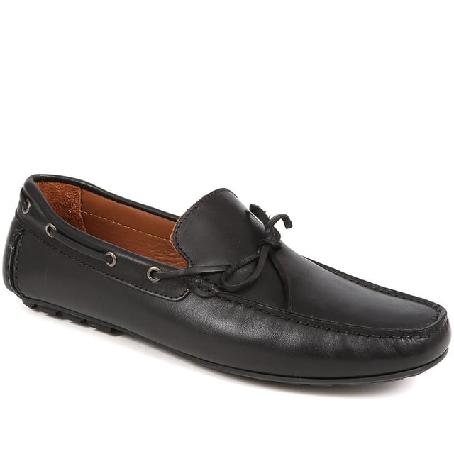 Discover the epitome of luxury with our exquisite leather moccasins, meticulously crafted from premium leather to provide unparalleled comfort and sophistication. These timeless slip-on shoes boast a streamlined silhouette and supple leather lining, making them the ideal choice for those seeking both style and refinement.
