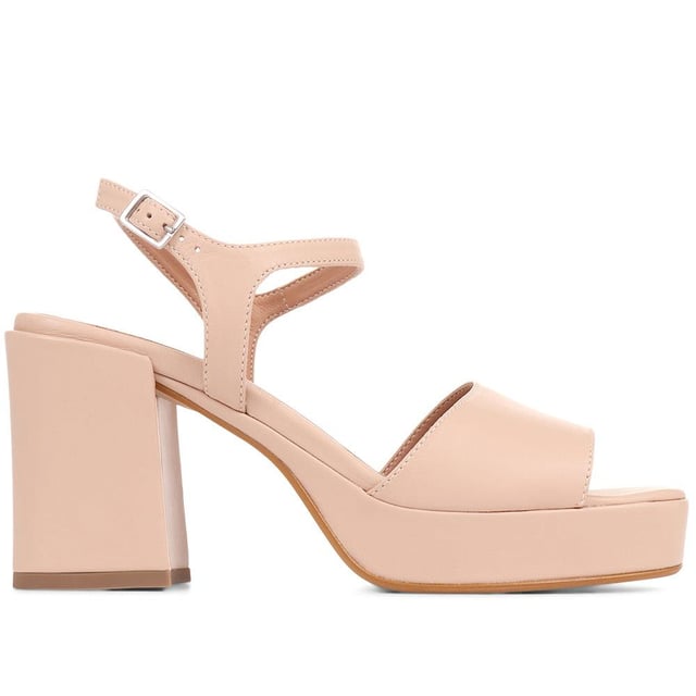 Giuseppa are our statement platform heels, a non-negotiable for occasion wardrobes. Poised on a perfectly balanced suede-covered platform sole, Giuseppa's straps are cut from the softest suede for a chunky, sculpted appearance. Imagined with a vintage-inspired soft square toe, the heeled sandals are fastened by a simple strap at the ankle and lined with a luxe leather footbed for a comfortable finish.