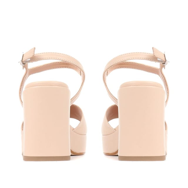Giuseppa are our statement platform heels, a non-negotiable for occasion wardrobes. Poised on a perfectly balanced suede-covered platform sole, Giuseppa's straps are cut from the softest suede for a chunky, sculpted appearance. Imagined with a vintage-inspired soft square toe, the heeled sandals are fastened by a simple strap at the ankle and lined with a luxe leather footbed for a comfortable finish.