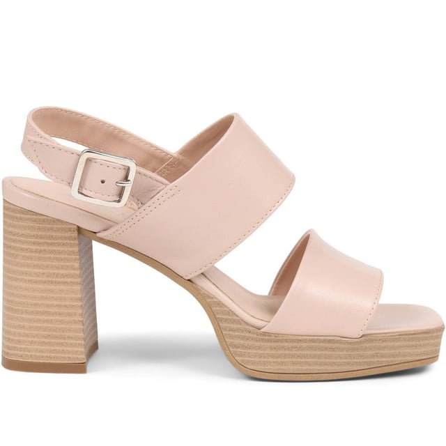 Step back in time with the Diona platform sandals and embrace the 70s vibe. Made from soft leather, this sandal features crossing straps, an ankle strap with a buckle fastening, and a chunky platform sole with a comfortable block heel. Whether it's a special occasion or a night out, these sandals will elevate your look with effortless style and comfort.