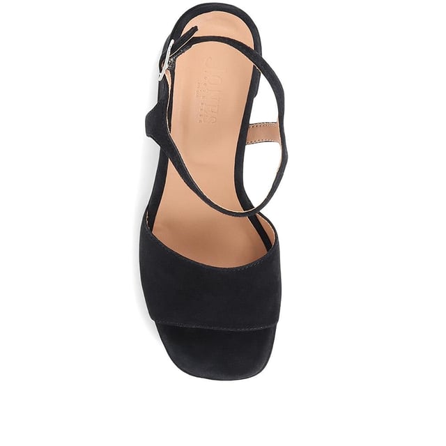 Giuseppa are our statement platform heels, a non-negotiable for occasion wardrobes. Poised on a perfectly balanced suede-covered platform sole, Giuseppa's straps are cut from the softest suede for a chunky, sculpted appearance. Imagined with a vintage-inspired soft square toe, the heeled sandals are fastened by a simple strap at the ankle and lined with a luxe leather footbed for a comfortable finish.