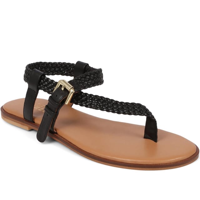 Slide into our leather toe-post sandals, where the simplicity of a flat sole meets intricate charm. Perfect for those balmy days and breezy evenings, they blend effortless style with a hint elegance.