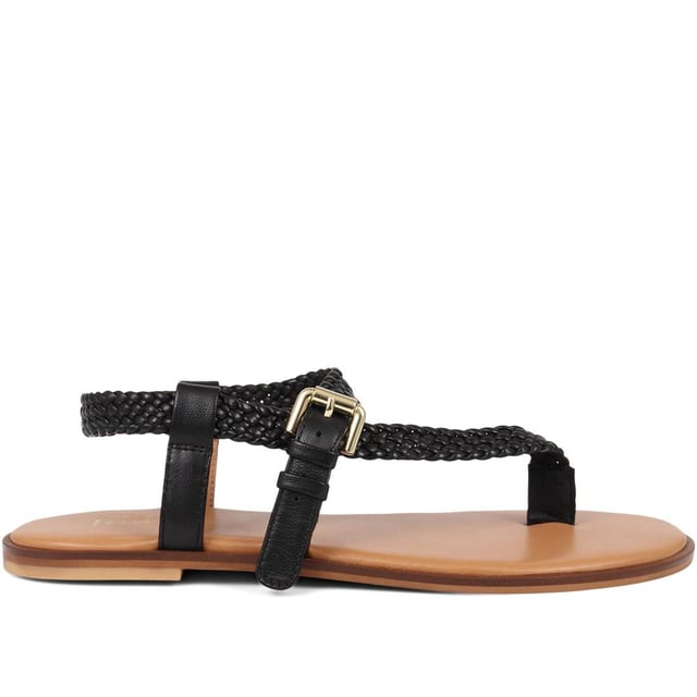 Slide into our leather toe-post sandals, where the simplicity of a flat sole meets intricate charm. Perfect for those balmy days and breezy evenings, they blend effortless style with a hint elegance.