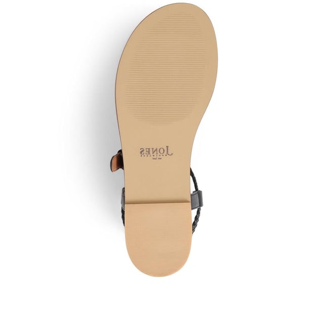 Slide into our leather toe-post sandals, where the simplicity of a flat sole meets intricate charm. Perfect for those balmy days and breezy evenings, they blend effortless style with a hint elegance.