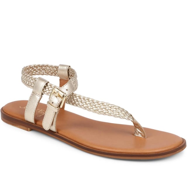Slide into our leather toe-post sandals, where the simplicity of a flat sole meets intricate charm. Perfect for those balmy days and breezy evenings, they blend effortless style with a hint elegance.