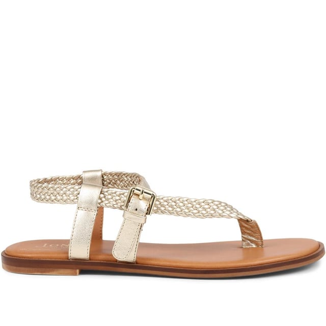 Slide into our leather toe-post sandals, where the simplicity of a flat sole meets intricate charm. Perfect for those balmy days and breezy evenings, they blend effortless style with a hint elegance.