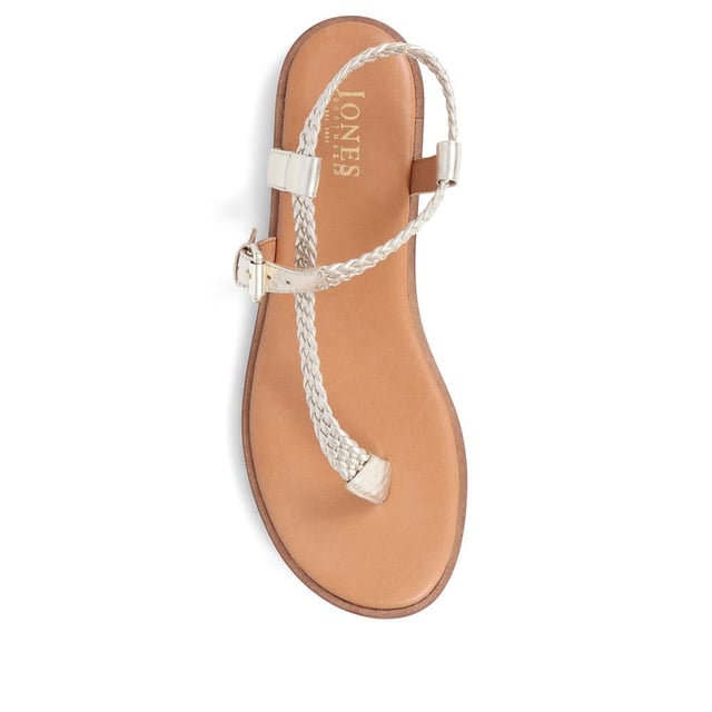 Slide into our leather toe-post sandals, where the simplicity of a flat sole meets intricate charm. Perfect for those balmy days and breezy evenings, they blend effortless style with a hint elegance.