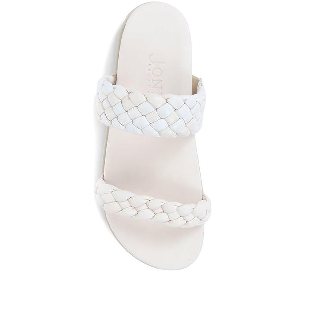 In equal parts cool and comfortable, the Madeira platform sandals boast a bold silhouette that will step you through hot days and holidays. Artfully braided with butter soft leathers, the duo of quilted straps make the perfect pairing with cropped denim jeans or flowing summer dresses. Complete with a moulded leather footbed that's been shaped to fit and cushion your form.