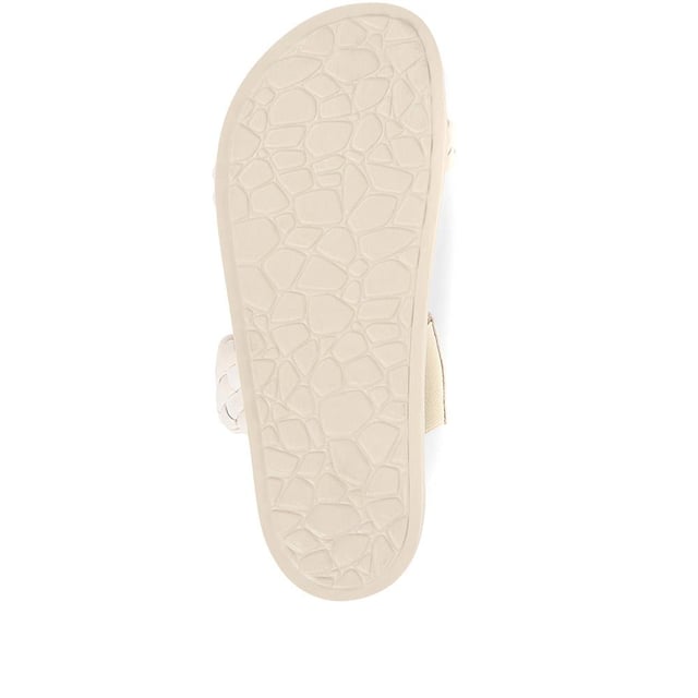 In equal parts cool and comfortable, the Madeira platform sandals boast a bold silhouette that will step you through hot days and holidays. Artfully braided with butter soft leathers, the duo of quilted straps make the perfect pairing with cropped denim jeans or flowing summer dresses. Complete with a moulded leather footbed that's been shaped to fit and cushion your form.