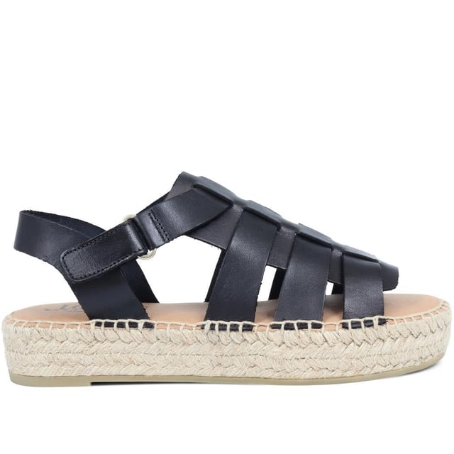 Step out with supreme summer style on your side with these Belisa flatform sandals, easily dressed up or down for dressy or casual occasions alike. Allow a multitude of quality leather straps to encase the foot, leaving enough room to be breathable and comfortable in the summer heat.