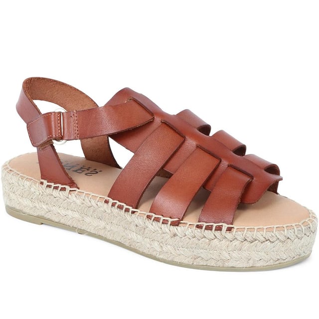 Step out with supreme summer style on your side with these Belisa flatform sandals, easily dressed up or down for dressy or casual occasions alike. Allow a multitude of quality leather straps to encase the foot, leaving enough room to be breathable and comfortable in the summer heat.