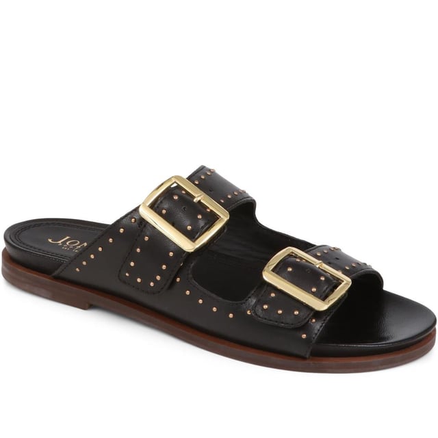 Introducing the ultimate pair of ladies casual mule sandals, perfect for those who like to keep their style effortless yet elegant. Crafted from premium leather and adorned with silver studded embellishments, these sandals will step you through any day to night look.