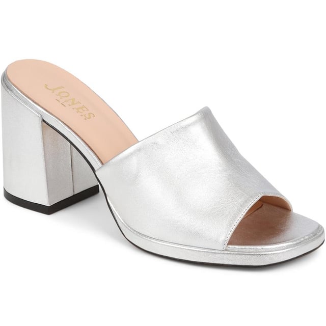 Slip into something a little more sophisticated with these leather mule sandals, boasting a luxurious suede upper and a just-right mid-height block heel. Perfect for weddings and elegant gatherings, these mules blend classic charm with contemporary chic, ensuring you step out in style.
