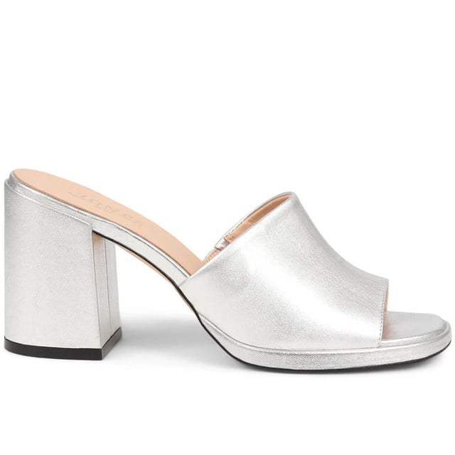 Slip into something a little more sophisticated with these leather mule sandals, boasting a luxurious suede upper and a just-right mid-height block heel. Perfect for weddings and elegant gatherings, these mules blend classic charm with contemporary chic, ensuring you step out in style.