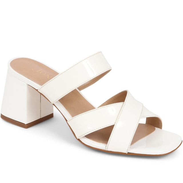 Stride with confidence in our slip-on mule sandals, featuring a chunky block heel that combines comfort with a touch of modern flair. These easy-to-wear mules are the perfect choice for adding a bold statement to your outfit, whether you're dressing up for a special occasion or simply elevating your everyday look.