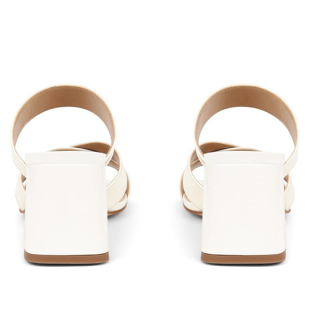 Stride with confidence in our slip-on mule sandals, featuring a chunky block heel that combines comfort with a touch of modern flair. These easy-to-wear mules are the perfect choice for adding a bold statement to your outfit, whether you're dressing up for a special occasion or simply elevating your everyday look.
