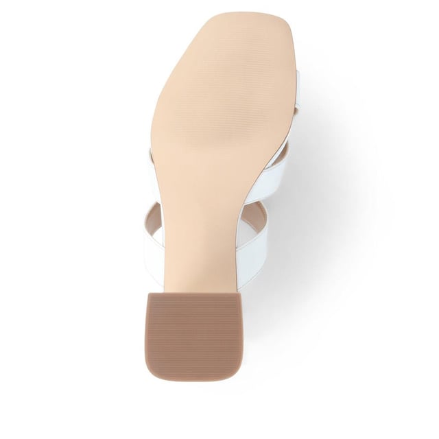 Stride with confidence in our slip-on mule sandals, featuring a chunky block heel that combines comfort with a touch of modern flair. These easy-to-wear mules are the perfect choice for adding a bold statement to your outfit, whether you're dressing up for a special occasion or simply elevating your everyday look.