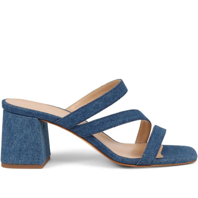 Step out with a playful twist in these heeled mule sandals, featuring crisscross straps and a chunky heel for a casual yet elevated look. Perfect for adding a dash of fun to your step, they're a versatile choice for brunches to evening dates.