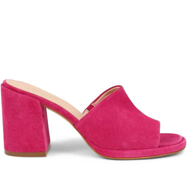 Slip into something a little more sophisticated with these leather mule sandals, boasting a luxurious suede upper and a just-right mid-height block heel. Perfect for weddings and elegant gatherings, these mules blend classic charm with contemporary chic, ensuring you step out in style.