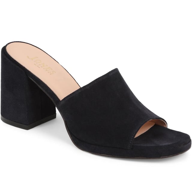 Slip into something a little more sophisticated with these leather mule sandals, boasting a luxurious suede upper and a just-right mid-height block heel. Perfect for weddings and elegant gatherings, these mules blend classic charm with contemporary chic, ensuring you step out in style.