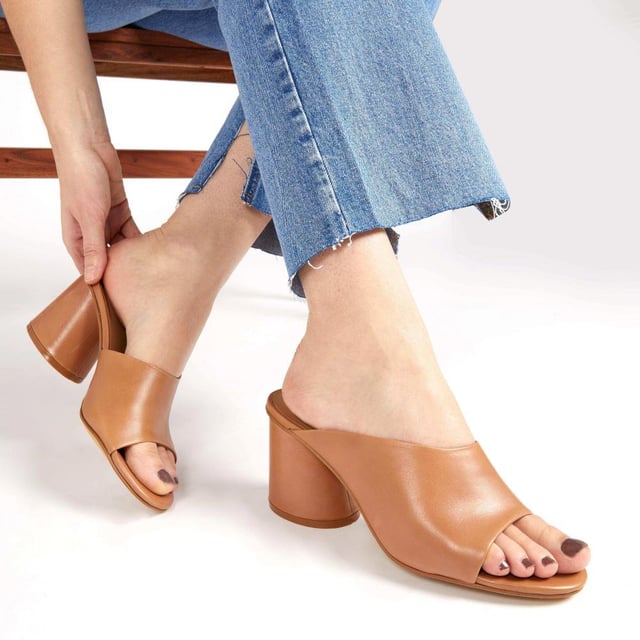 Keep it chic and endlessly comfortable with these minimalist yet statement mules, all you need to turn heads this season. Whether worn with jeans or dresses, these have all it takes to sign your look off with a 70s edge.