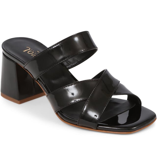 Stride with confidence in our slip-on mule sandals, featuring a chunky block heel that combines comfort with a touch of modern flair. These easy-to-wear mules are the perfect choice for adding a bold statement to your outfit, whether you're dressing up for a special occasion or simply elevating your everyday look.
