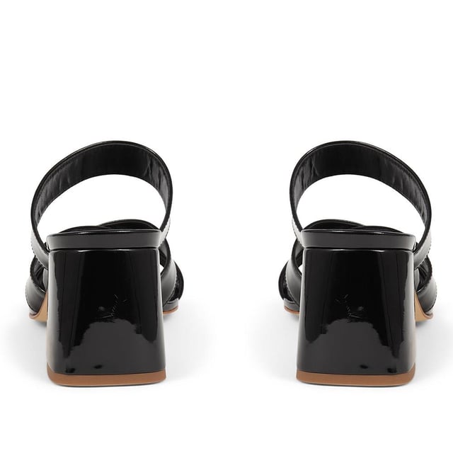 Stride with confidence in our slip-on mule sandals, featuring a chunky block heel that combines comfort with a touch of modern flair. These easy-to-wear mules are the perfect choice for adding a bold statement to your outfit, whether you're dressing up for a special occasion or simply elevating your everyday look.
