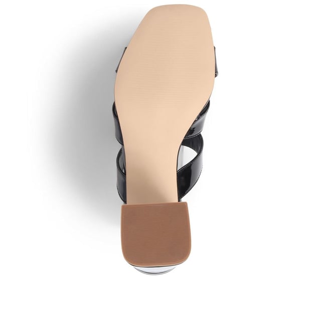 Stride with confidence in our slip-on mule sandals, featuring a chunky block heel that combines comfort with a touch of modern flair. These easy-to-wear mules are the perfect choice for adding a bold statement to your outfit, whether you're dressing up for a special occasion or simply elevating your everyday look.