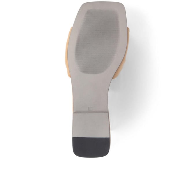 Spend summer with our Madelena mules. With their sleek leather design, cushioned footbed, and daringly minimalist silhouette, they're the perfect blend of elegance and simplicity.