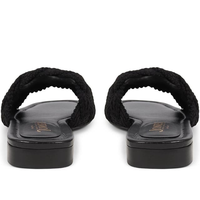Slide into the textured embrace of these woven slide sandals, and channel artisanal charm and understated elegance. These are your go-to for a relaxed yet polished look that carries you through the summer with ease.