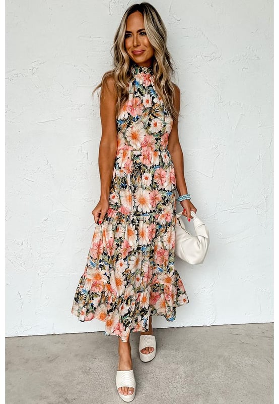 Charming and impressive black boho floral print dress
  Halter design with knot nape
  Sleeveless pocketed flowy dress that is flattering for most body types
  Popular dropship maxi dress with patterns
  Available in sizes S M L and XL
  Size chart provided in both cm and inches
Material: 100% Polyester