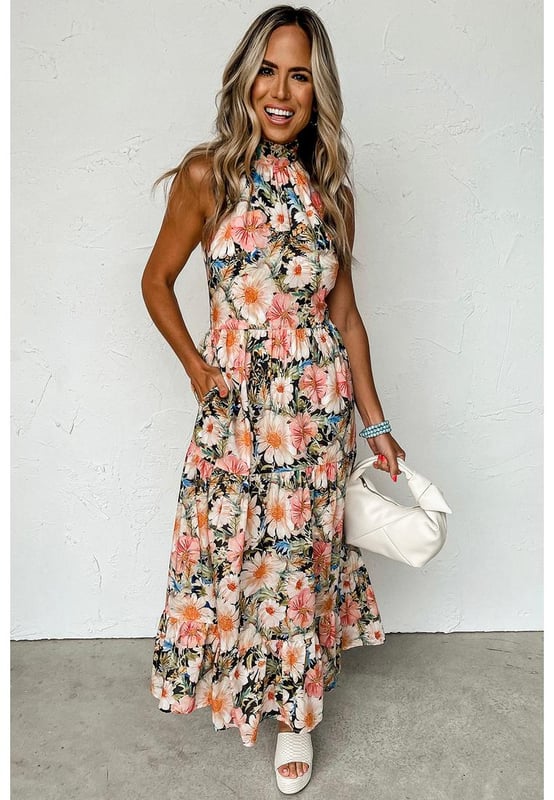 Charming and impressive black boho floral print dress
  Halter design with knot nape
  Sleeveless pocketed flowy dress that is flattering for most body types
  Popular dropship maxi dress with patterns
  Available in sizes S M L and XL
  Size chart provided in both cm and inches
Material: 100% Polyester