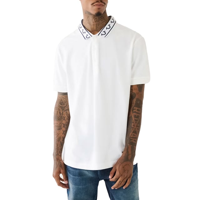 True Religion Mens Polo Shirt
Style Code:  107945
100% Cotton
Made in India
Embossed Arched True Religion Logo
Short Sleeve
Ribbed Collar & Sleeve
Soft Cotton Fabric
Relaxed Fit
Machine Washable
Split Side Hem