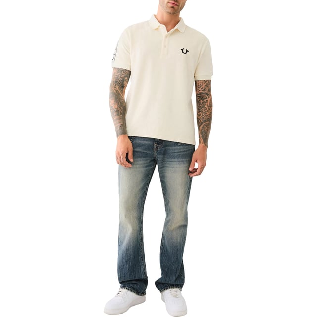 True Religion Mens Polo Shirt
Style Code:  107563
100% Cotton
Made in India
Signature Horseshoe on The Chest
Logo Trim Down The Shoulder Seam
Short Sleeve
Ribbed Collare & Sleeve
Soft Cotton Fabric
Regular Fit
Machine Washable
Split Side Hem