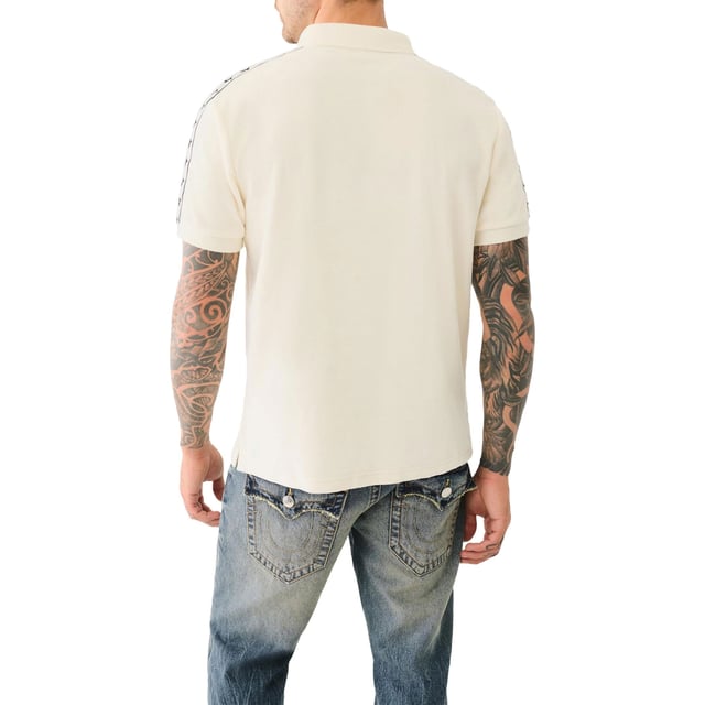 True Religion Mens Polo Shirt
Style Code:  107563
100% Cotton
Made in India
Signature Horseshoe on The Chest
Logo Trim Down The Shoulder Seam
Short Sleeve
Ribbed Collare & Sleeve
Soft Cotton Fabric
Regular Fit
Machine Washable
Split Side Hem