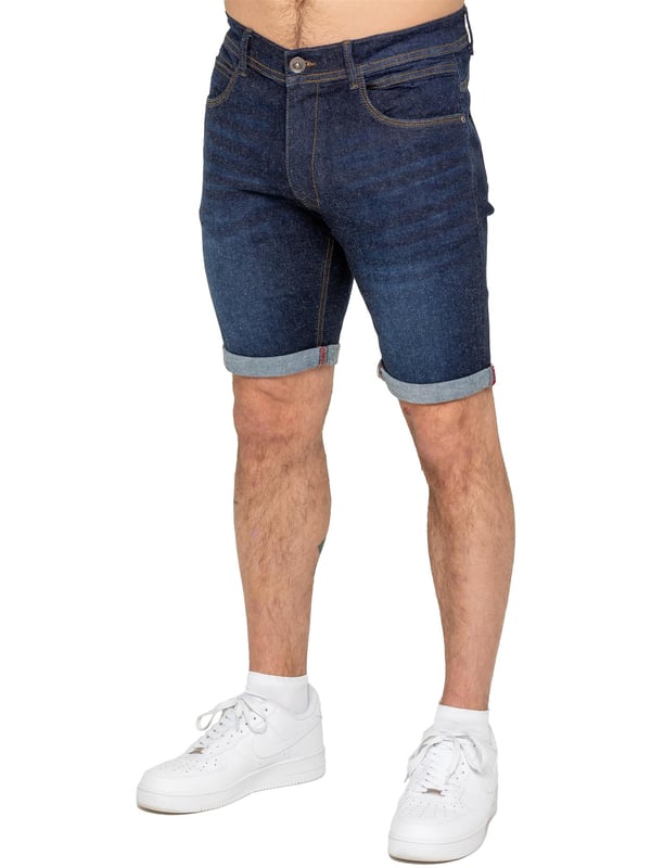 Die Enzo Herren Stretch Denim Shorts bieten die perfekte Kombination aus Stil und Komfort. Mit einer schmalen Passform und aus elastischem Stoff gefertigt, sorgen sie für Flexibilität und einen eleganten Look. Mit klassischem 5-Pocket-Design, Reißverschluss und einem umgeschlagenen Saum für einen modernen Touch sind diese Shorts ein Muss für jede legere Garderobe. Ideal für warme Tage, vereinen sie Praktikabilität mit mühelosem Stil.