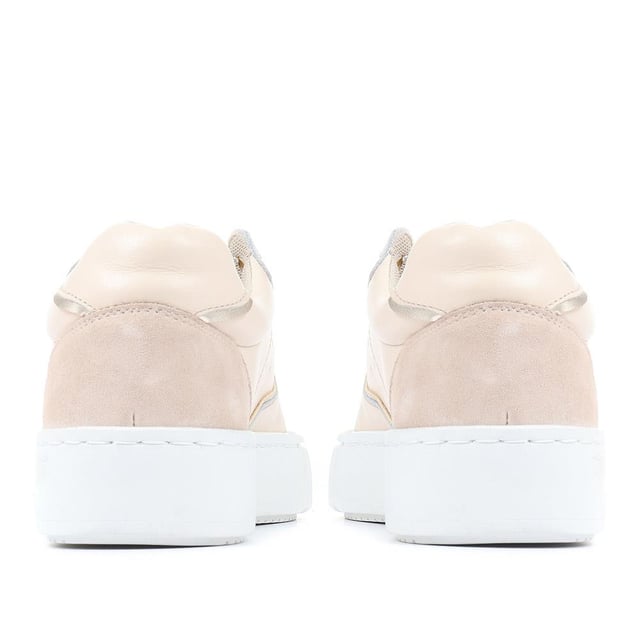 Our Norah lace-up trainers are all about playing with texture. Sculpted in smooth leather with perforated detailing across the vamp and sides, Norah features a suede tongue and heel overlay. Through a soft cushioned footbed, contrasted with a chunky ribbed toe bumper and shining eyelet hardware, Norah achieves perfect balance. Play with texture further by pairing Norah with all manner of materials - from chiffon to cotton, denim to velvet.
