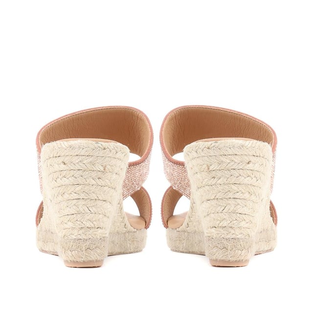 Does it get more summery than wedge sandals? We think not. The Amabelle mule sandals have been made in Spain with supple leather straps and shaped with an open-toe silhouette that's primed for the summer sun. The espadrille inspired jute sole is classic in its own right, so opt to wear them with timeless summer staples like a floating maxi dress or palazzo pants.