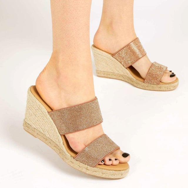 Does it get more summery than wedge sandals? We think not. The Amabelle mule sandals have been made in Spain with supple leather straps and shaped with an open-toe silhouette that's primed for the summer sun. The espadrille inspired jute sole is classic in its own right, so opt to wear them with timeless summer staples like a floating maxi dress or palazzo pants.