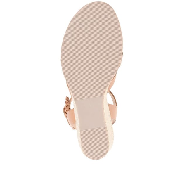 Step up your suave for those summer soirees with this beautifully feminine sandal, seated on a wedge for added comfort. With interwoven straps of leather and leather lining, you'll be on your feet in style all day with no problems.