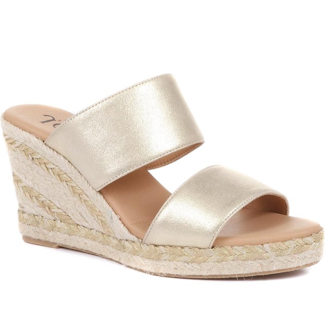Does it get more summery than wedge sandals? We think not. The Amabelle mule sandals have been made in Spain with supple leather straps and shaped with an open-toe silhouette that's primed for the summer sun. The espadrille inspired jute sole is classic in its own right, so opt to wear them with timeless summer staples like a floating maxi dress or palazzo pants.