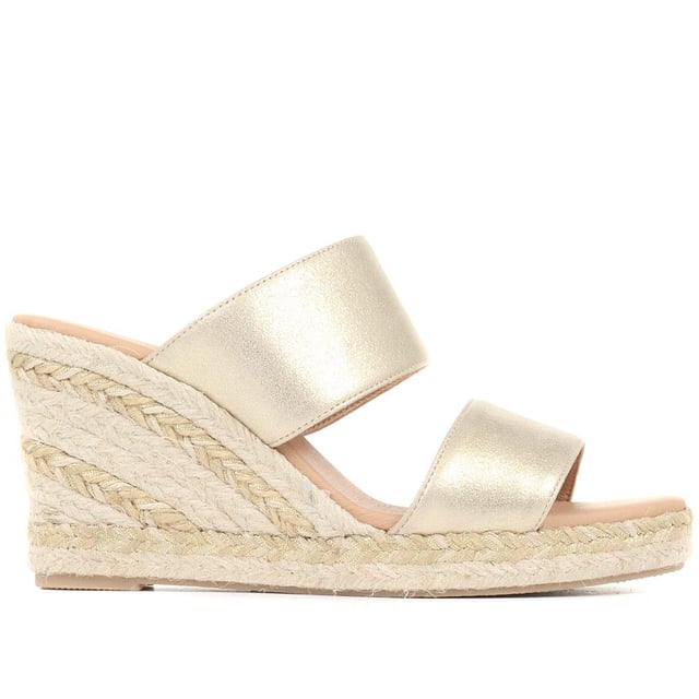 Does it get more summery than wedge sandals? We think not. The Amabelle mule sandals have been made in Spain with supple leather straps and shaped with an open-toe silhouette that's primed for the summer sun. The espadrille inspired jute sole is classic in its own right, so opt to wear them with timeless summer staples like a floating maxi dress or palazzo pants.
