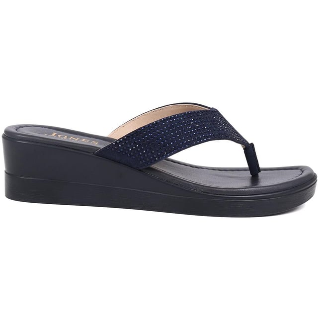 Sparkle in our toe-post wedges, adorned with a dazzling diamante upper and a comfortably mid-height heel. Ideal for carefree holiday evenings, these wedges add just the right amount of glamour to your relaxed, sun-kissed look.