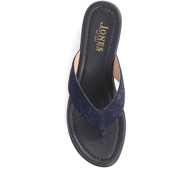 Sparkle in our toe-post wedges, adorned with a dazzling diamante upper and a comfortably mid-height heel. Ideal for carefree holiday evenings, these wedges add just the right amount of glamour to your relaxed, sun-kissed look.