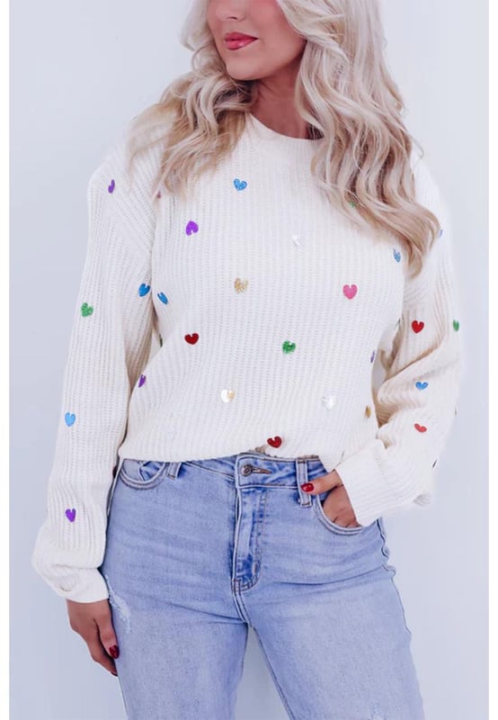 Patrón de corazón en forma de lentejuelas beige  
Tejido de punto tipo waffle suave  
Cuello redondo clásico  
Diseño de corazón con lentejuelas que llama la atención  
Suéter glamuroso ideal para looks casuales  
Material: 50% Viscosa 28% Poliéster 22% Poliamida